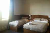 Kamar Tidur Douglas Hotel