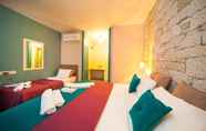 Bedroom 4 Ionic Hotel