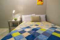 Kamar Tidur Mellow Apartelle and Tourist Inn