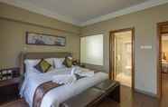 Kamar Tidur 6 Jinjiang Peninsula Seasons Hotel