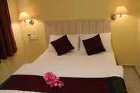 ห้องนอน Pudu Inn Hotel