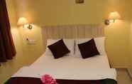 Bedroom 2 Pudu Inn Hotel