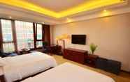 Kamar Tidur 5 Xinyu Hotel