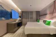 ห้องนอน ibis Styles Wuhan Optics Valley Square Hotel