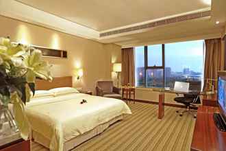Kamar Tidur 4 Leisure Hotel Dongguan