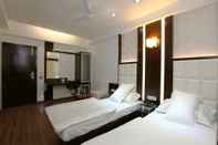 Bedroom Hotel Atithi