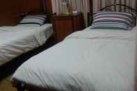 Kamar Tidur Soutchai Pakse Backpacker Hostel