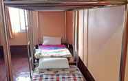 ห้องนอน 4 Soutchai Pakse Backpacker Hostel