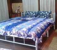 ห้องนอน 7 Soutchai Pakse Backpacker Hostel