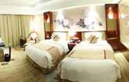 Bedroom 5 New Century Hotel Yiwu