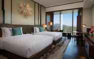 Bedroom 3 HUALUXE Xiamen Haicang Harbour View, an IHG Hotel