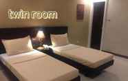 ห้องนอน 4 Urbantel Hotel