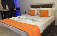 Kamar Tidur 2 Ser Suite Hotel