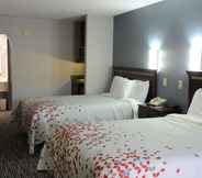 Bedroom 4 Gateway Inn and Suites