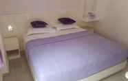 Kamar Tidur 7 Lavender Riverside Hotel - Hostel