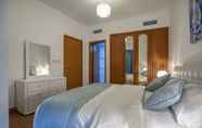 Kamar Tidur 5 The Waves by Deluxe Holiday Homes