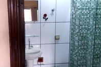 Phòng tắm bên trong Pousada do Beto