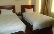 Bedroom 2 GreenTree Inn Tianjin Wuqing Jingbin Industrial Park Chengwang Road Express Hotel