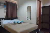 ห้องนอน Calamba Pension Plaza