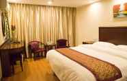 Bedroom 7 GreenTree Inn TaiZhou XingHua WuLi Road WuLi Bridge Express Hotel