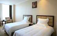 Bedroom 6 GreenTree Inn Shaoxing Keqiao Xingyue Road Zhongqing Building Hotel