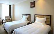 Bedroom 6 GreenTree Inn Shaoxing Keqiao Xingyue Road Zhongqing Building Hotel