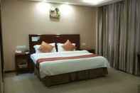 ห้องนอน GreenTree Inn Puyang Pushang Huanghe Road Hotel