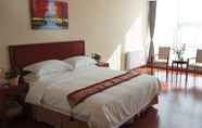 Bedroom 7 GreenTree Inn WeiHai RongCheng Bus Station BORDER TRADE CITY Express Hotel