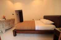 Bedroom Omah D'Taman Hotel by EPS