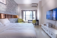 ห้องนอน Guangzhou Mimi Apartment