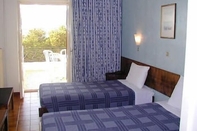 Kamar Tidur Oasis Hotel