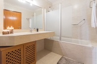 In-room Bathroom Ajuda II by An Island Apart