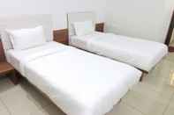 Kamar Tidur Hotel Ashray Inn Express