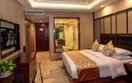 Kamar Tidur 5 Days Hotel & Suites Shishi