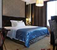 Bedroom 2 Dongguan Silverworld Garden Hotel
