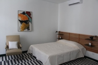 Bilik Tidur DoBairro Suites at Bairro Alto