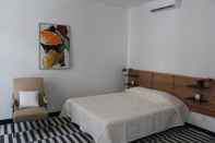 Bedroom DoBairro Suites at Bairro Alto