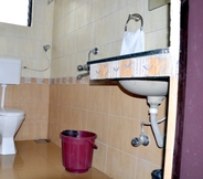 In-room Bathroom 3 FabHotel Magnus Calypso Viman Nagar