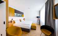 Bedroom 5 mk hotel rüsselsheim