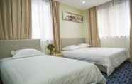 Kamar Tidur 2 Hangzhou Memory Travel International Hotel- Edge West Lake