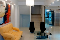 Lobby Lofts & Suites Rosario