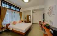 Kamar Tidur 5 Mango Bellana Boutique Hotel