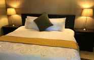 Kamar Tidur 4 The Garden Venue Hotel