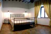 Bedroom Agriturismo Belvedere Cramaccioli
