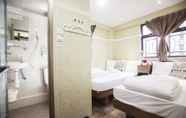 Kamar Tidur 2 Happy Peach Guest House