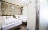 Kamar Tidur 3 Happy Peach Guest House