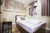 Kamar Tidur Happy Peach Guest House