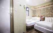 Kamar Tidur 7 Happy Peach Guest House