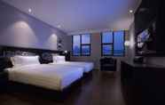 Kamar Tidur 3 Orange Crystal Hotel Wusi Square Seaview