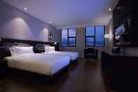Bedroom Orange Crystal Hotel Wusi Square Seaview